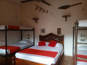 Postel nebo postele na pokoji v ubytování La Casa del Viajero Mompos
