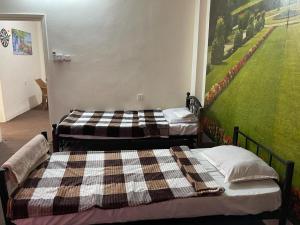 Ein Bett oder Betten in einem Zimmer der Unterkunft super deluxe for 8 guests apartment
