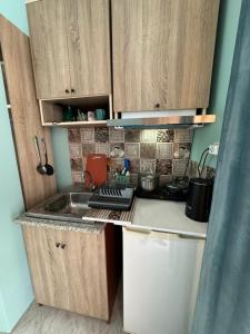 Cucina o angolo cottura di Гостевой дом при кафе оазис