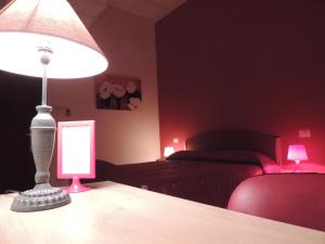 Voodi või voodid majutusasutuse Albergo Ma.Re toas