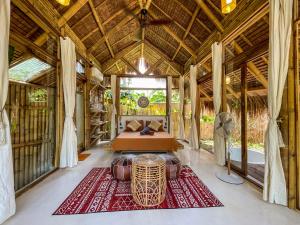 Gambar di galeri bagi The Bamboo Houses - Tropical Garden & Empty Beach di General Luna