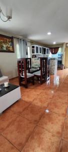 a living room with a couch and a table at Apartamento Mariam in La Puntica de Juan Dolio +24 photos