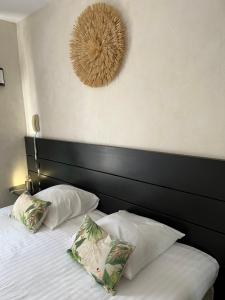 Postel nebo postele na pokoji v ubytování hôtel Le Synaya