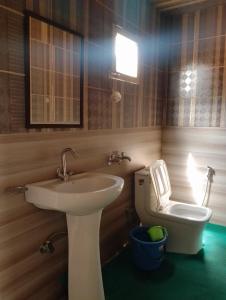 Kylpyhuone majoituspaikassa Milam Cottage