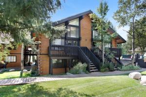 a house with a staircase in front of it at Boho Chalet in Vail on Free Bus Route in Vail