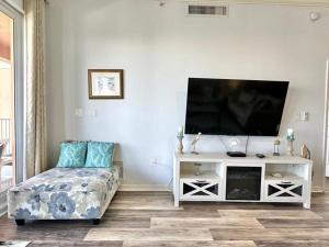 TV a/nebo společenská místnost v ubytování Harborview Grande 406