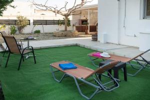 Patio nebo venkovní prostory v ubytování Afrathias Beachhouse - Cretan Hideaway