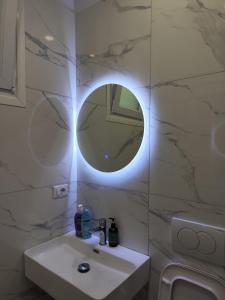 Koupelna v ubytování Mia Lake Apartament + 10 fotografií