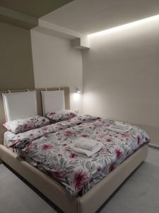 Postel nebo postele na pokoji v ubytování Mia Lake Apartament