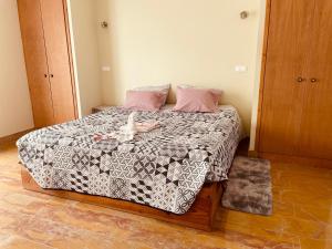 A bed or beds in a room at Belle Vue