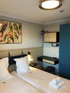 Postel nebo postele na pokoji v ubytování HOTEL LEHOUCK