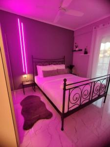 Gulta vai gultas numurā naktsmītnē Amalia's Luxury Apartment