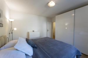 Postel nebo postele na pokoji v ubytování Apartments Bilopavlović
