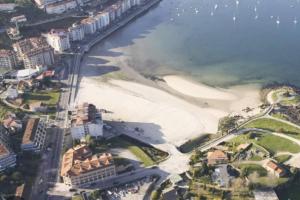 an aerial view of a beach and the ocean at Erizana in Baiona