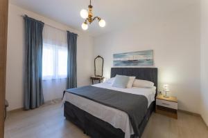 Postel nebo postele na pokoji v ubytování Apartments Bilopavlović