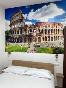 Laura luxury apartment in the center Rome في روما: صورة عن مبنى الكولسيوم في روما