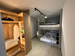 a walk in closet with bunk beds in it at Villa Coco in Sarajevo +63 photos