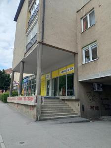 Budova, kde se apartmán nachází + 4 fotografie