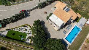 Et luftfoto af Four Seasons private villa - seaview - big heated pool - gym - sport activities