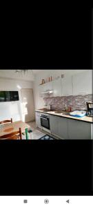 Η κουζίνα ή μικρή κουζίνα στο Chez Paulette