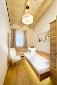 Posteľ alebo postele v izbe v ubytovaní Apartment Dorfjuwel