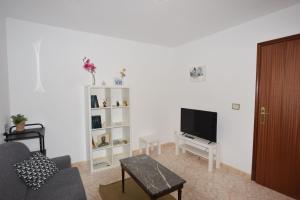 Et tv og/eller underholdning på Apartamento Mar Muxia