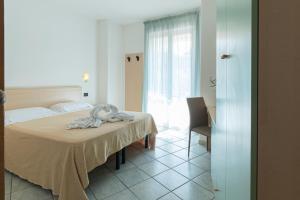 Postel nebo postele na pokoji v ubytování Victoria Park Resort + 73 fotografií