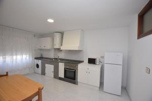 Køkken eller tekøkken på Apartamento Mar de Muxía