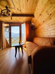 Istumisnurk majutusasutuses Eco Cottage Panorama Merisi