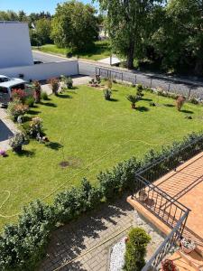 Vonkajšia záhrada v ubytovaní Rege apartman 2