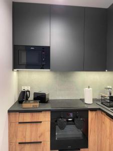 Kuchyňa alebo kuchynka v ubytovaní Apartment 41