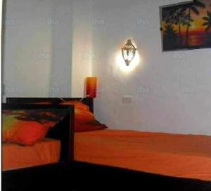 Postel nebo postele na pokoji v ubytování Appartamento sul mare
