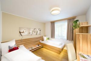 Posteľ alebo postele v izbe v ubytovaní Apartment Dorfjuwel