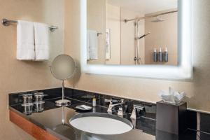 a bathroom with a sink and a mirror at The Westin Boston Seaport District in Boston