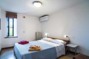 En eller flere senge i et værelse på La Torretta - ACrapa Mangia + 6 billeder