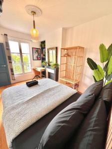 Posezení v ubytování T3 Le Louvre d' Enghien 2 Rooms 3 Beds 10mn Paris + 54 fotografií