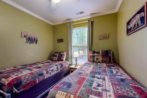 Ένα ή περισσότερα κρεβάτια σε δωμάτιο στο Baskins Creek Hideaway