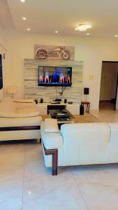 TV tai viihdekeskus majoituspaikassa Sublime Villa