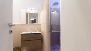 a bathroom with a shower and a sink at Sardinianworld - Casa Sofia in Oristano +23 photos