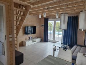 TV a/nebo společenská místnost v ubytování A&M Apartamenty