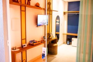 TV o dispositivi per l'intrattenimento presso Pousada Sollari