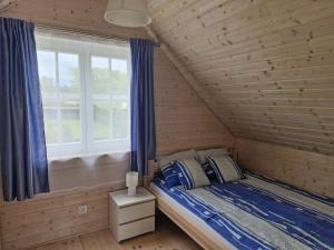 Postel nebo postele na pokoji v ubytování A&M Apartamenty