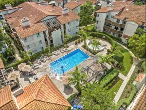 an overhead view of a swimming pool at a apartment complex at Ritz Pointe Paradise! in Dana Point