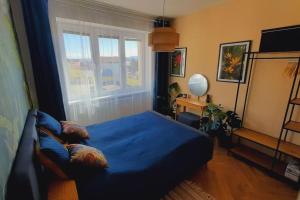 Llit o llits en una habitació de Apartment Botanica