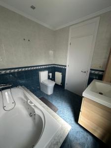 Ванная комната в Casa Suomi
