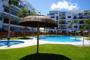 The swimming pool at or close to Aguacate Beach Apartamentos Playa Granada