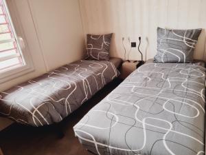Ένα ή περισσότερα κρεβάτια σε δωμάτιο στο Chalet Etxean