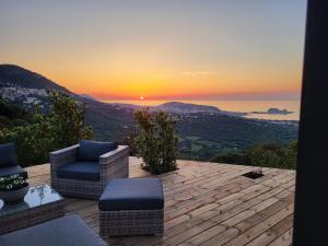 a sunset from the deck of a house at tre castelli in Monticello