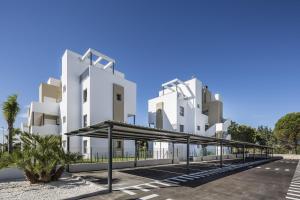 a rendering of a building with a parking lot at Souvenir by ON Travel in Oliva