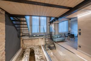 a view of a room with a dirty floor in a building at Anfihouse - Assisi Relais in Assisi